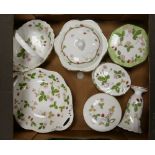 A collection of Wedgwood Wild Strawberry patterned items to include: vases, lidded pots,