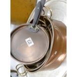 A collection of Brass Handled Pans: together with similar lidded sauce pan(4)