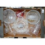 A mixed collection of glassware to include cranberry glass bowl, baskets,