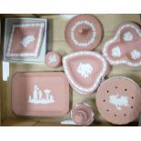 A collection of Wedgwood white on coral items to include: trays, ashtrays, lidded pot,