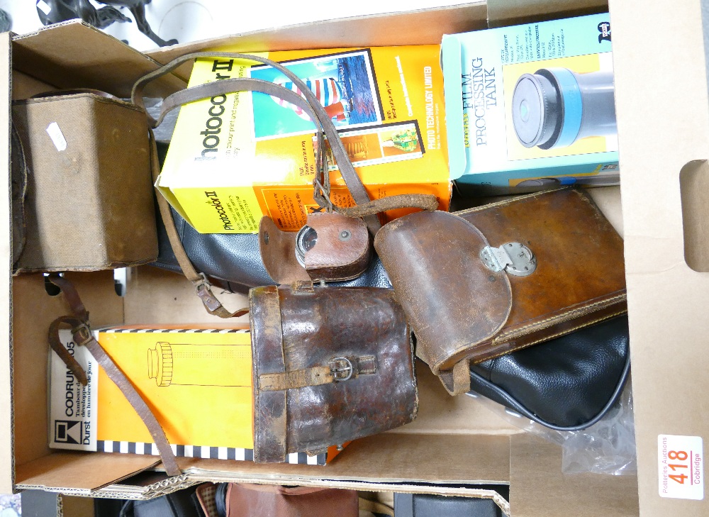 A mixed collection of items to include: Vintage Binoculars, Leather cased bellows Kodak Camera,