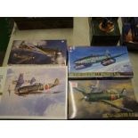 Three boxed Hornby model fighter kits: together with a Tamiya fighter kit (4).