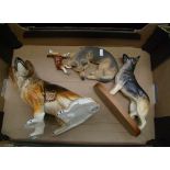 A collection of Pottery Alsatian Dogs: