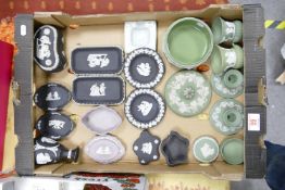 A collection of Wedgwood jasper ware to include black and green items: rectangle trays, lidded
