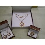 A matching set of leather cased Chavin 18ct rose gold on Sterling Silver: necklace, earrings and