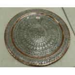 A metal Islamic large round decorated wall plaque: