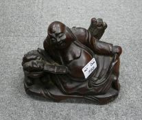 Chinese Carved Wood Figure of Reclining Buddha: height 19cm