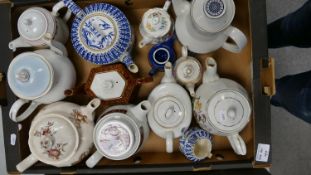 A collection of China & Ironstone Teapots: