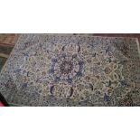 Persian silk and wool carpet: Some wear to the corners. 208cm x 123cm
