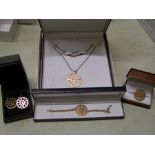 A matching set of leather cased Chavin 18ct rose gold on Sterling Silver: necklace, earrings,