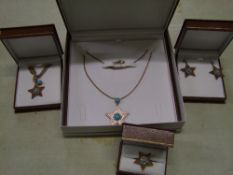 A matching set of leather cased Chavin 18ct rose gold on Sterling Silver: necklace, earrings,