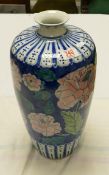 A large chinese vase: with pink flowers. Height 43cm