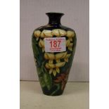 Moorcroft Pottery Wisteria Vase: Phillip Gibson Design Limited Edition MCC piece dated 1998. Boxed