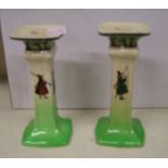 A pair of Royal Doulton series ware candlesticks: height 16.5cm ( some crazing)