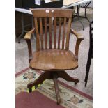 Vintage Oak swivel chair: with cast iron mechanism