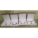 A quantity of leather boxed Chavin Sterling Silver and semi precious stone necklaces: (4).