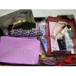 A mixed collection of items: to include ladies scarves, boxed wig, clutch bags, make up etc (1