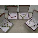 A quantity of leather boxed Chavin Sterling Silver and semi precious stone necklaces: (4).