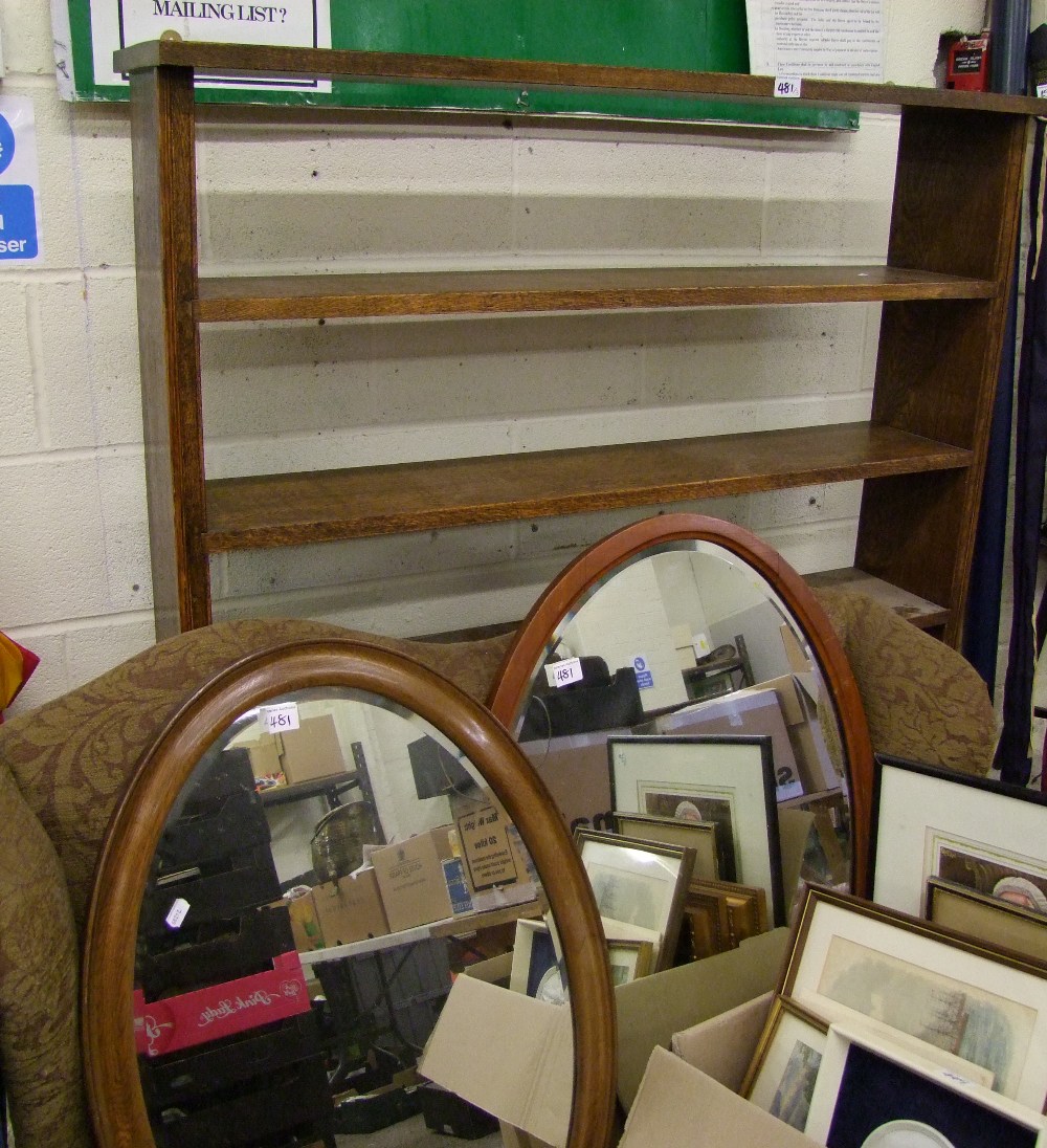 Oak six shelf open book case: together with two wood framed bevel edged oval mirrors. Height 142cm x