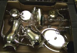 A collection of silver plated items to include: Teapots, Coasters, Candlestick etc