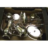 A collection of silver plated items to include: Teapots, Coasters, Candlestick etc