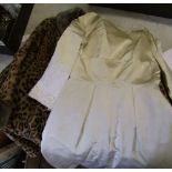 A vintage wedding dress and a faux fur coat: (2).