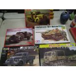 Two ICM German truck kits: together with a Revell German truck, Dragon truck and a Tamiya tank