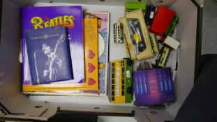 A collection of items to include: Beatles, records and books, cd's together with model toy cars to