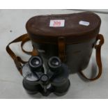 A pair of Ross of London binoculars: 12 x 50, model stepson. cased