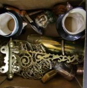 A mixed collection of items to include: horse brasses, brass bullet holder, ceramic character