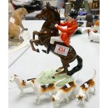 Beswick Rearing Huntsman 868: together with 4 hounds( huntsman with small grazes to both ears)(5)