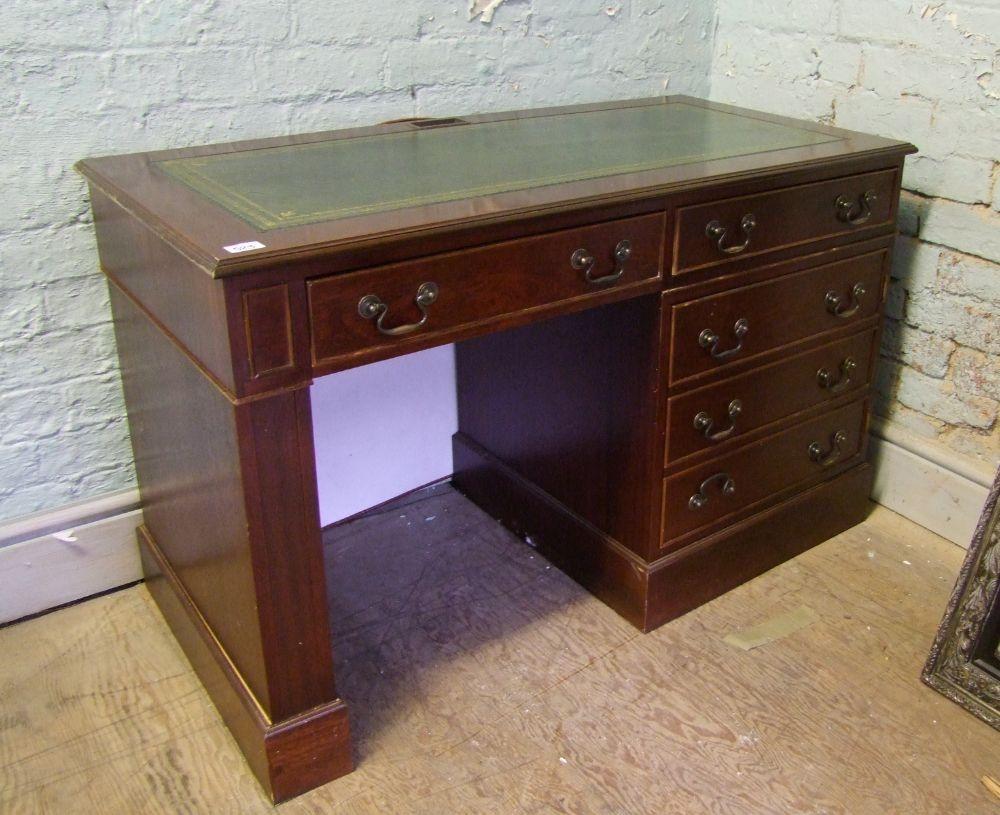 reproduction leather topped desk: 76cm high x 122cm long x 60cm depth