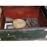 A vintage metal storage trunk: containing old boxing gloves, trouser press etc.