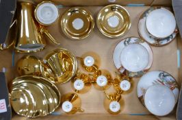 A collection of Bavarian Gilt decorated tea ware: together with oriental egg shell cups and saucers