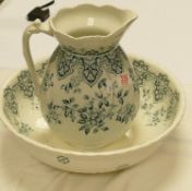 A large wash basin and jug: floral theme stamped Hanley Staffordshire rg no 195318. 39cm diameter