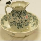 A large wash basin and jug: floral theme stamped Hanley Staffordshire rg no 195318. 39cm diameter