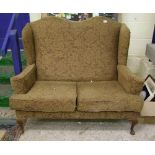 Two seater upholstered wing backed sofa: