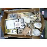 A mixed collection of items to include: silver plated cutlery, base metal dressing table set, silver