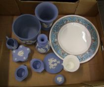 A collection of Wedgwood items to include: jasper ware vases, small planter & Trial Plate