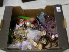 A collection of costume jewellery: watches, beads, bangles etc.