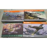 Three Eduard fighter plane model kits: together with a Tamiya model kit (4).
