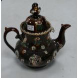 Large Measham 'bargeware' teapot: with domed cover, damage to upper lid, height 37cm