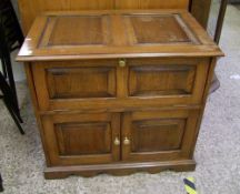 A quality reproduction oak drinks cabinet: