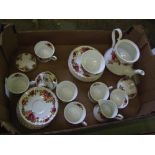 Floral bone china tea set: together with Royal Albert coasters and candlestick.