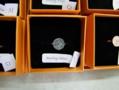 A quantity of boxed Chavin branded Sterling Silver rings: (20).