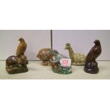 Beswick whisky decanters to include: otter, badger, eagle x 2, haggis, loch ness monster. All full