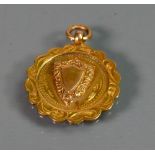 Victorian 9ct gold Shield medal: 4.6 grams.