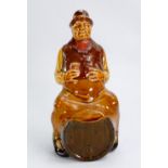 Royal Doulton Kingsware rare decanter as landlord seated astride a barrel: Height 24cm.