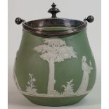 Wedgwood Sage green Jasperware biscuit barrel with silver plated rim: Height 17 cm.
