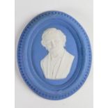 Wedgwood solid blue Jasper portrait medallion of Lloyd George: Modelled by Bert Bentley c1925, h16.